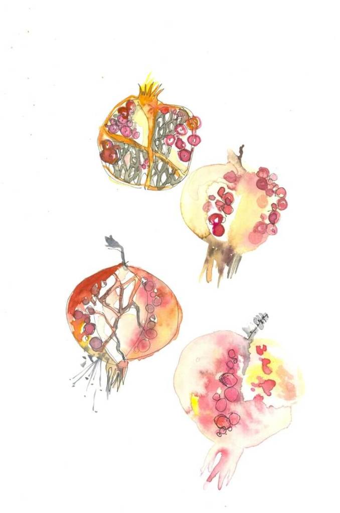 Four watercolor pomegranates, artfully arranged