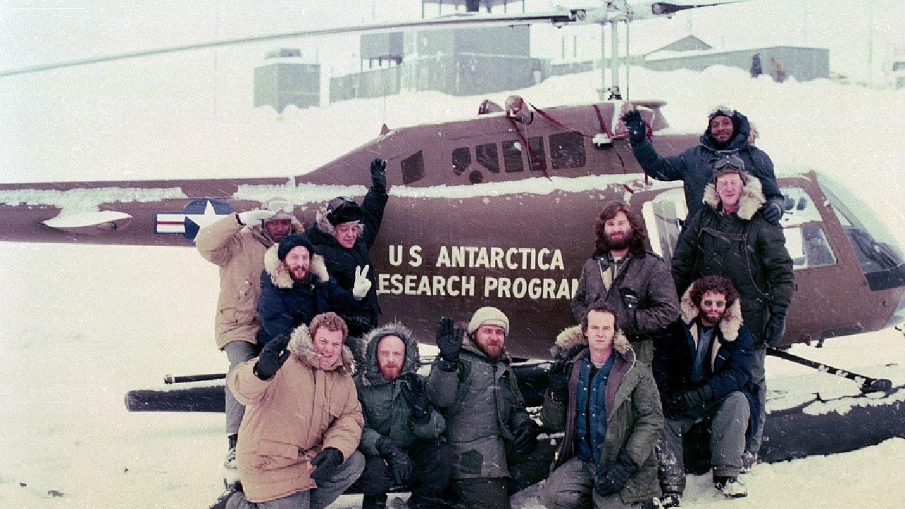 A group of men pose before