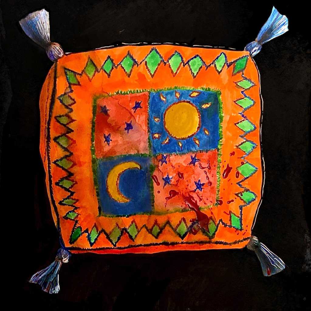 An orange pillow with a sun and a moon