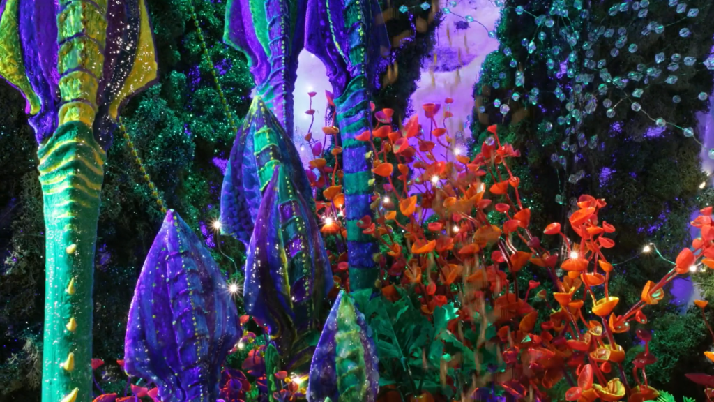 A lush colorful landscape with shimmering alien-like plants.