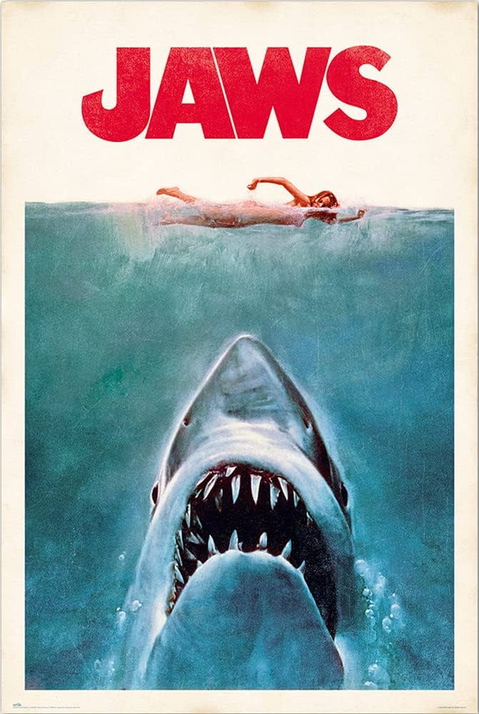 jaws movie poster where a shark looms upon an unsuspecting swimmer.